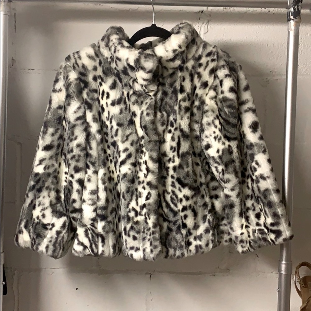 Fully lined nearly new snow leopard faux fur coat